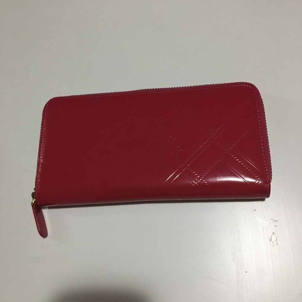 Carlo Rino red zip-around wallet